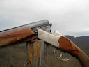 Puška TOZ - 34 je legendarna dvocijevna lovačka puška s vertikalnim rasporedom trupa, koju proizvodi Tulska tvornica oružja više od 50 godina. Tijekom tih godina proizved
