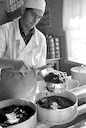 The photograph “Canning Black Caviar from Sturgeon Caught in the Volga River, Astrakhan, USSR, 1963” by renowned Soviet photojournalist Valery Shustov is far more than a 