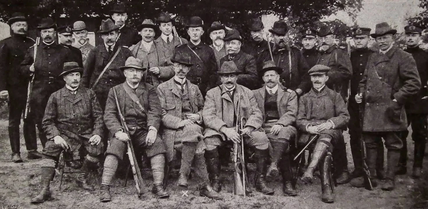 King of Sweden Gustaf V and his hunting party in Hunneberg in the fall of 1908. Eric Trolle, then minister for foreign affairs, sits on the King's left side and the man o