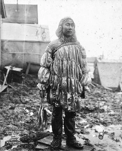 Inuit (Aleutian) in a park made from the insides of a sea lion. Nome, Alaska. The year is 1900.

Arctic hunters most often make trousers and shoes from the skins of marin